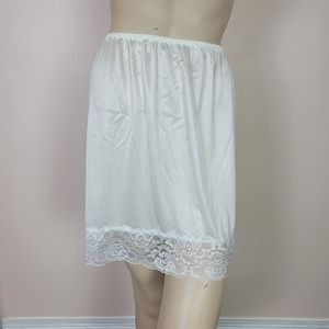 Vintage half slip with lace trim. Size medium
